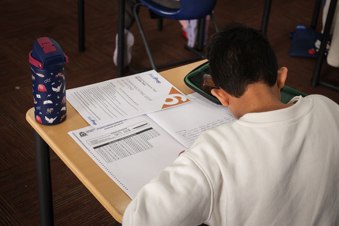 Student working through the question booklet