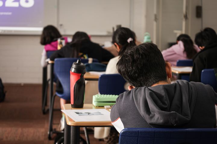 Students working through the mock paper