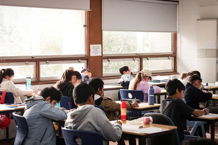 A full classroom sitting the mock exam