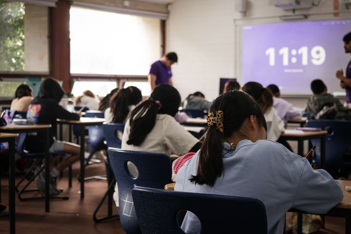 Rows of students under exam conditions