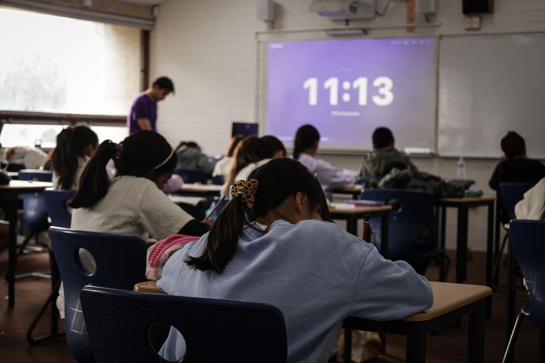 Rows of students under exam conditions